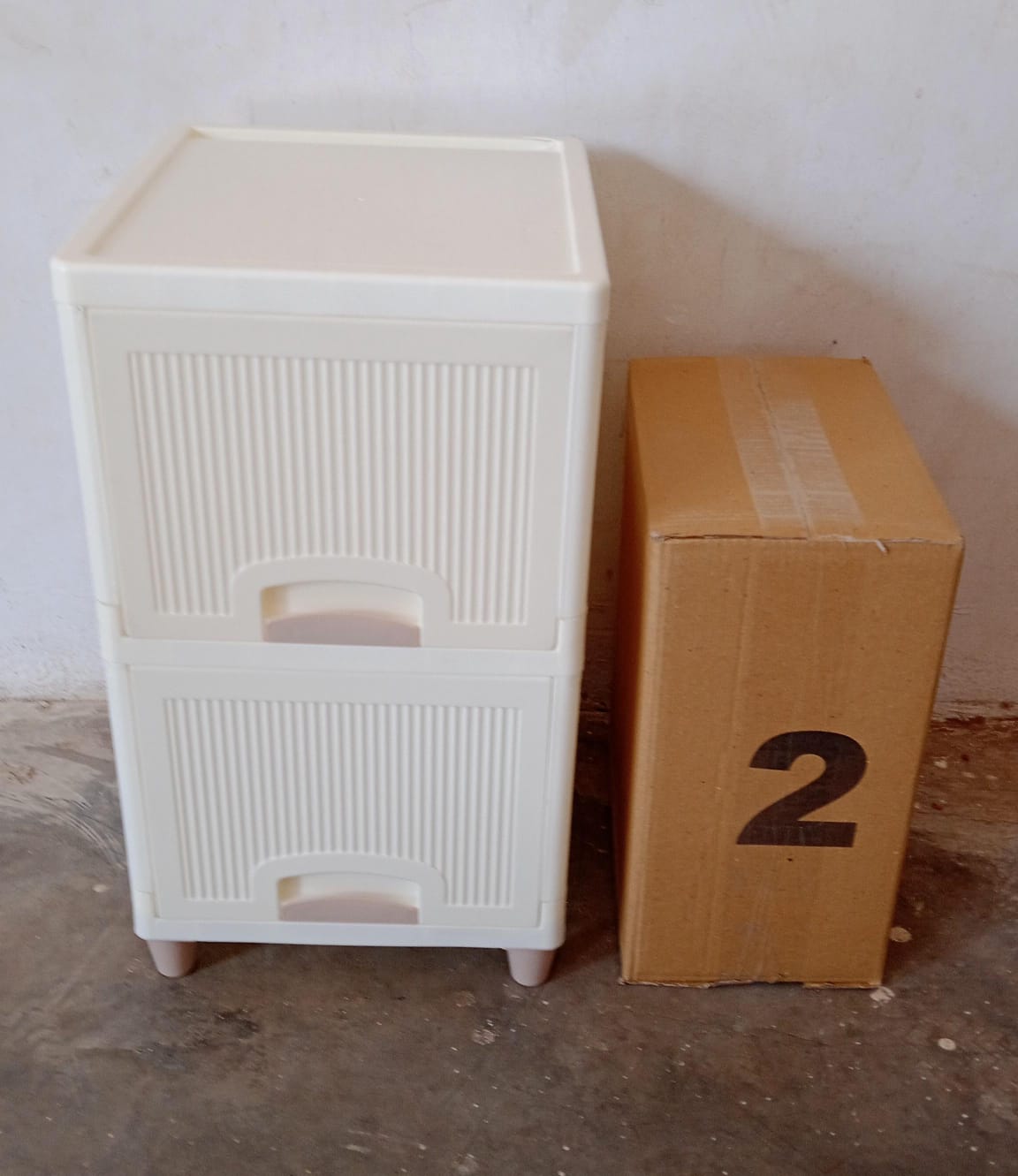 Wukusy 2-layer plastic multipurpose storage cabinet with foldable drawers for kitchen, bathroom, bedroom organization.