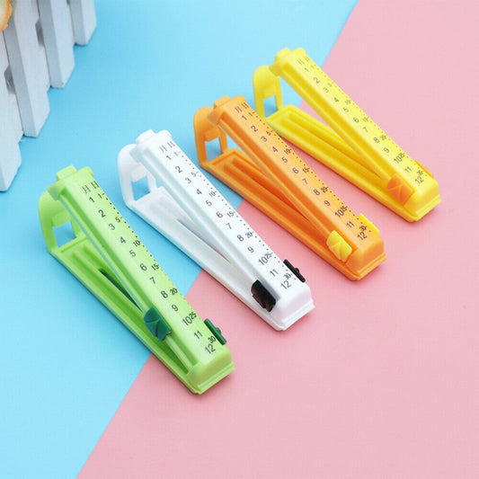 Wukusy 6309 4-piece food sealing clip set for sealing packed food to prevent contamination and keep items fresh.