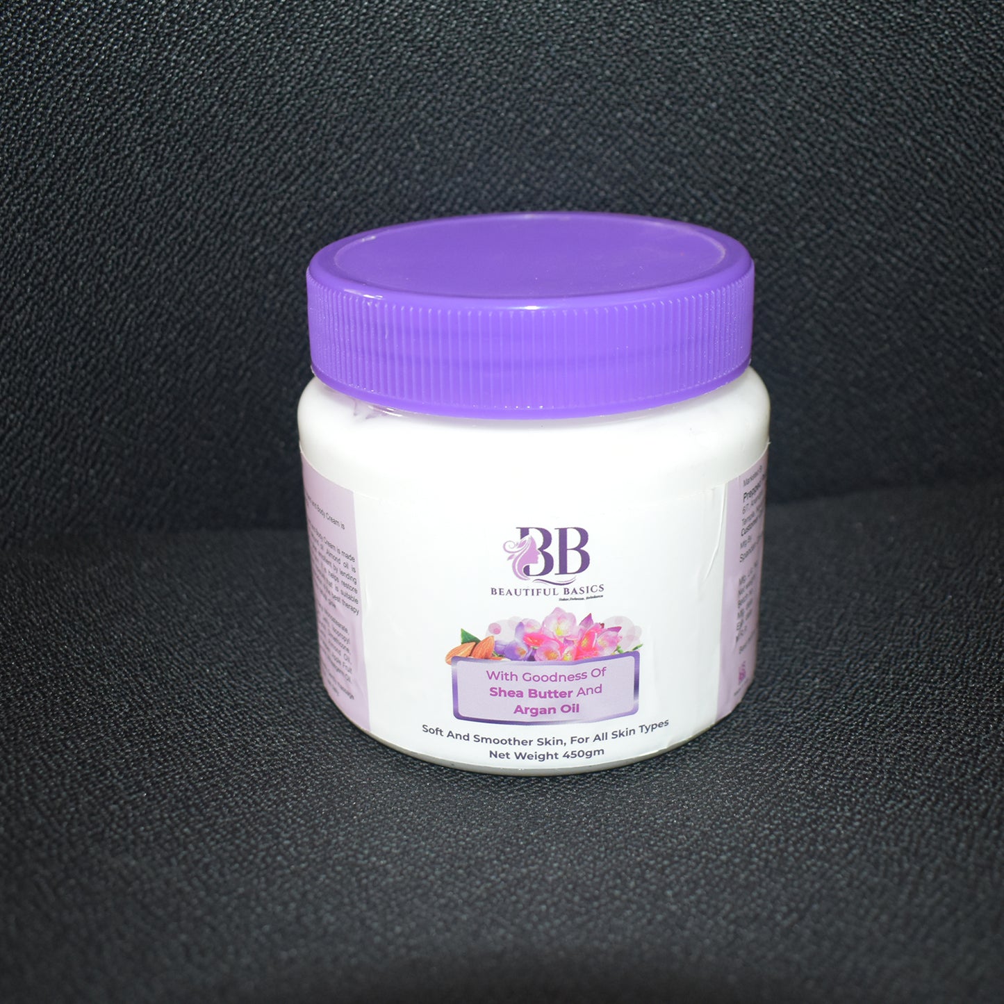 Wukusy Beautiful Basics Shea Butter and Argan Oil Body Cream in 450g jar, smooth creamy texture for nourishing skin.