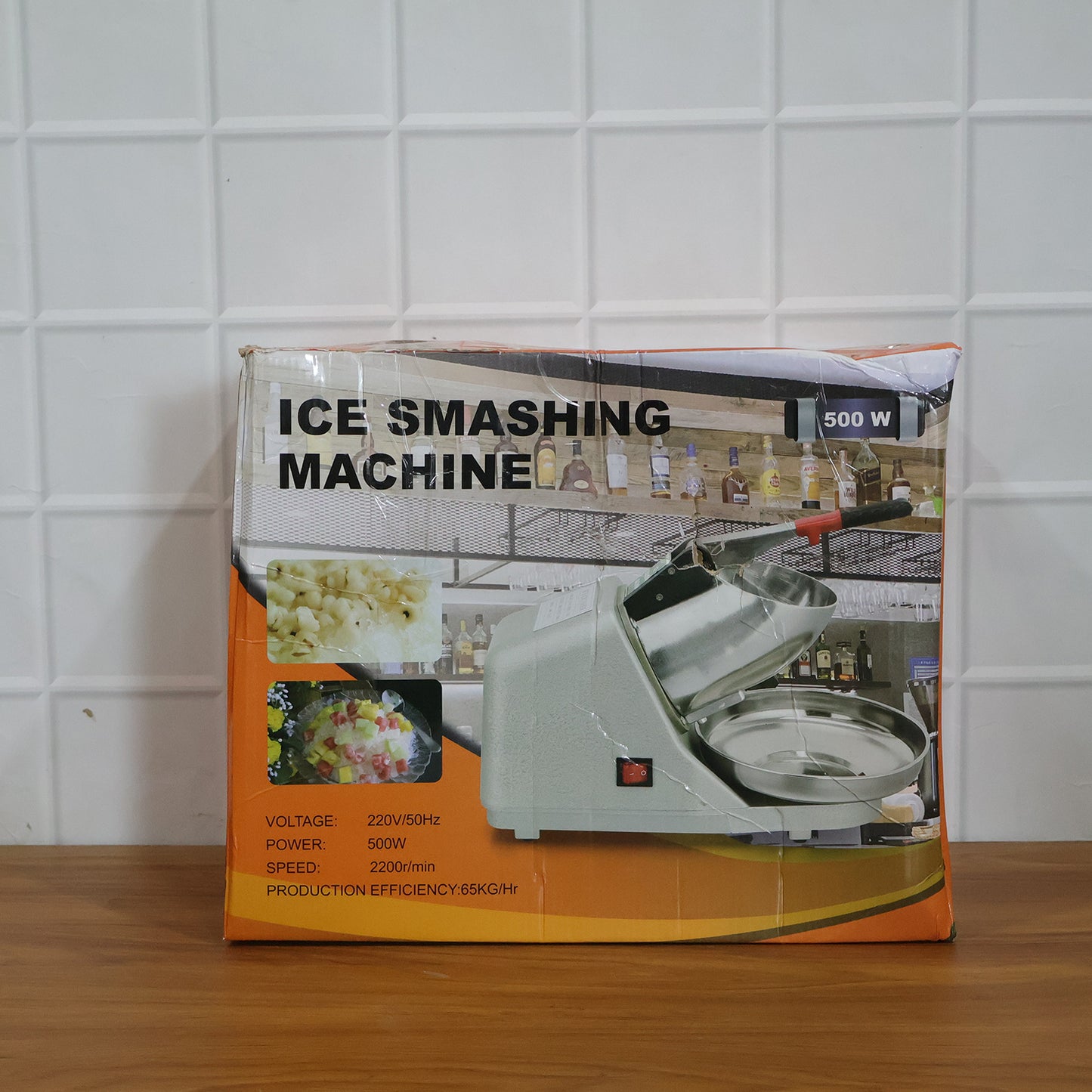 Wukusy electric ice crushing machine with stainless steel bowl, compact design for crushing ice efficiently at home or bar.