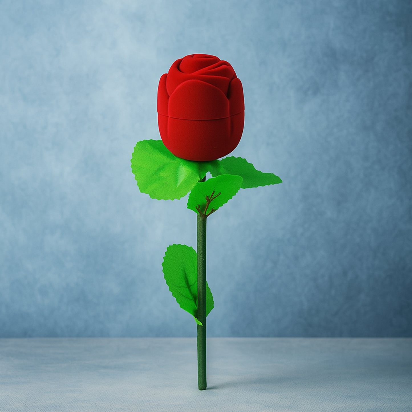 Wukusy artificial rose-shaped jewelry ring box with intricate petal design, perfect for storing rings or small jewelry pieces.