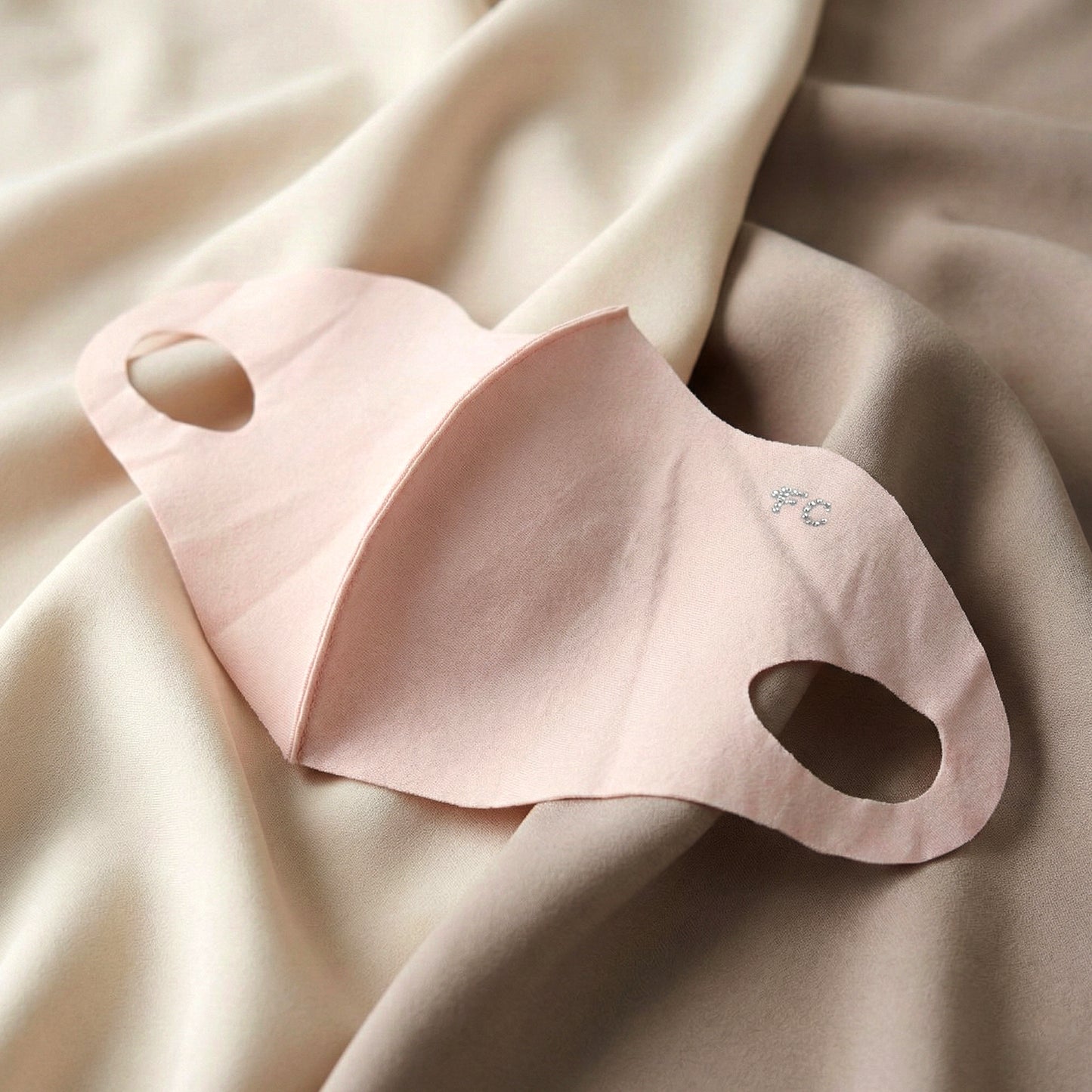 Wukusy Hyaluronic Acid 3D face mask for deep hydration, showing a close-up of the mask's textured surface and shape.
