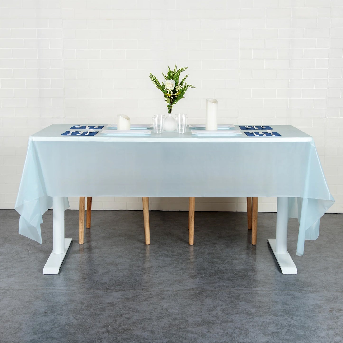 Waterproof disposable plastic table cover by Wukusy, 137x183 cm, ideal for protecting tables during meals and events.