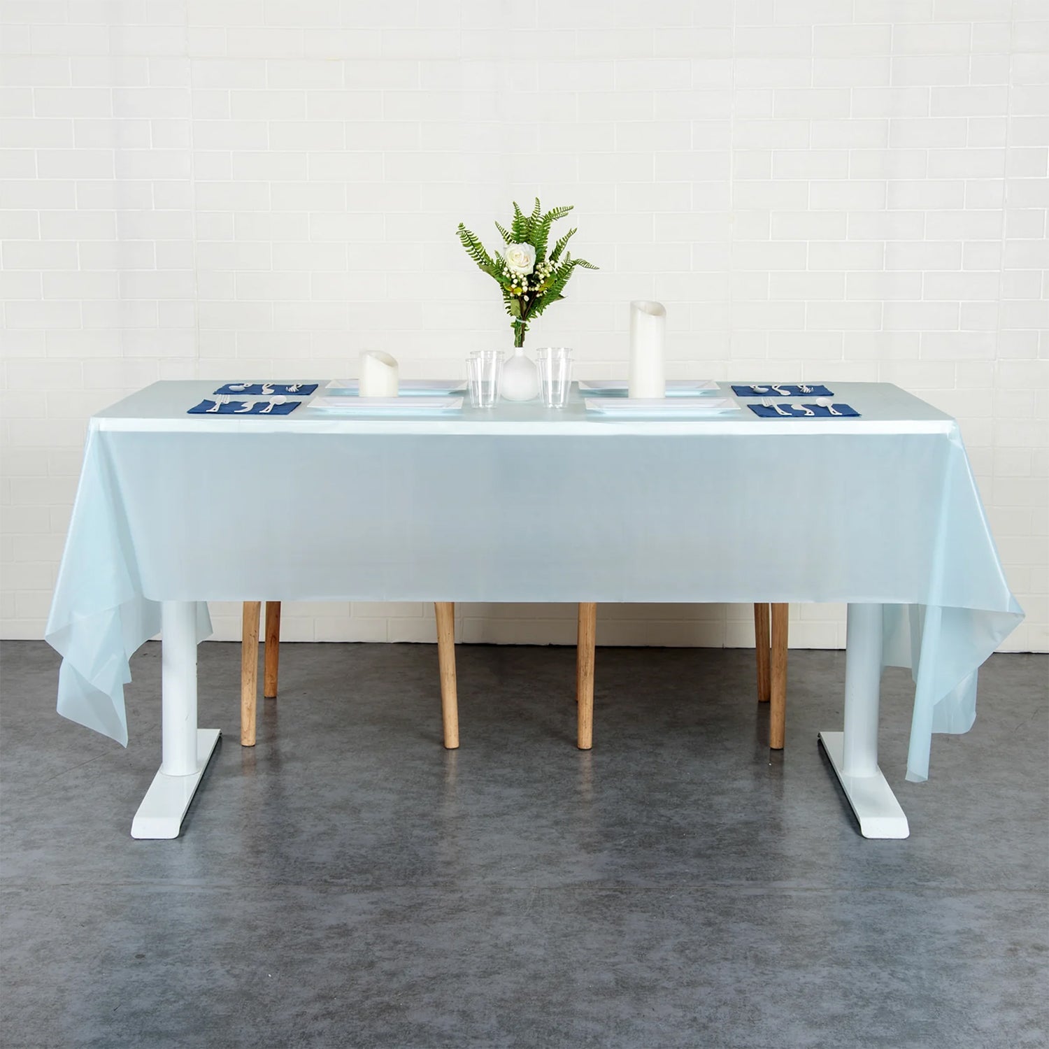 Waterproof disposable plastic table cover by Wukusy, 137x183 cm, ideal for protecting tables during meals and events.
