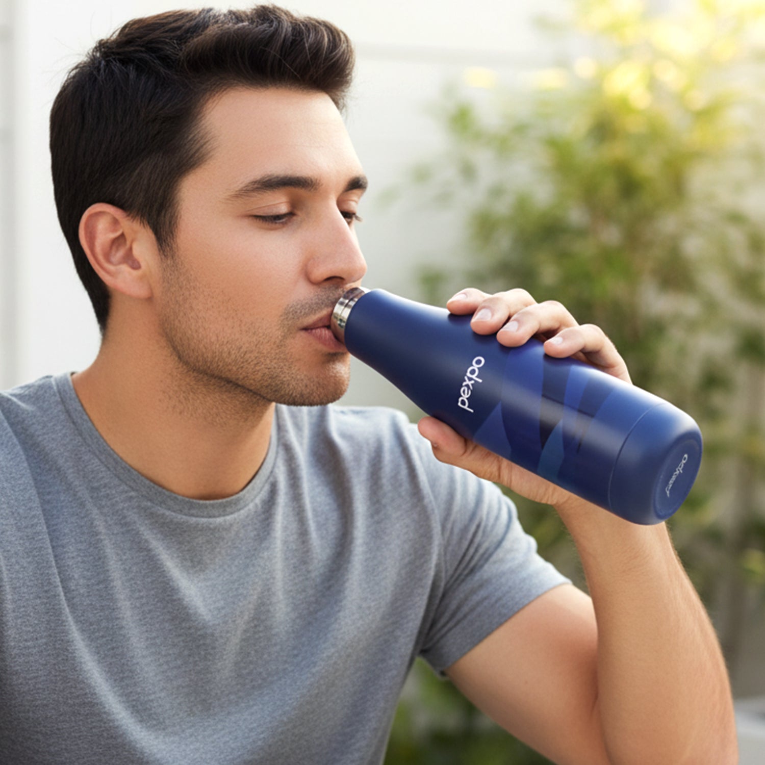 Wukusy Pexpo Infinity Art stainless steel water bottle, 750 ml capacity, with sleek design and vacuum insulation for hot and cold drinks