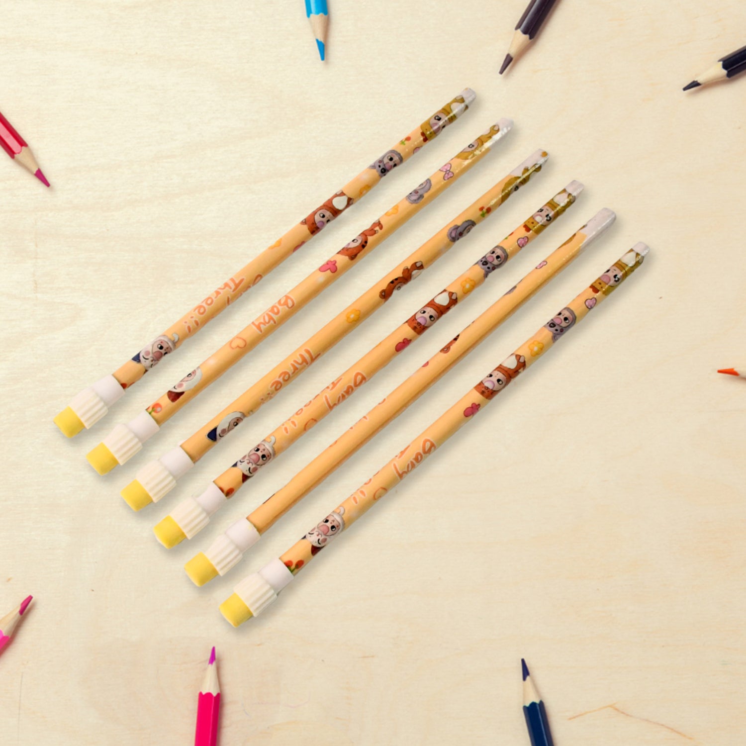 Wukusy 14-in-1 kids' stationery kit with colored pencils, markers, scissors, glue, and notebooks arranged on a table.