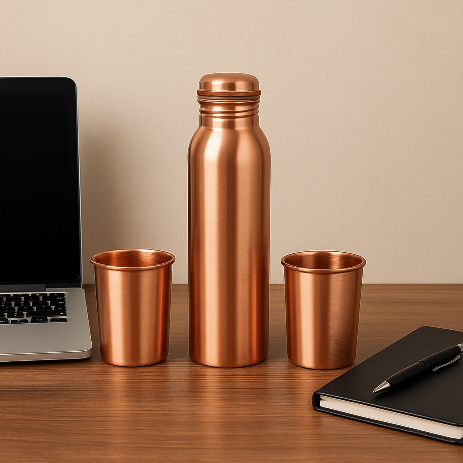 Copper water bottle with two glasses and gift box from Wukusy, featuring a polished copper finish and elegant packaging.