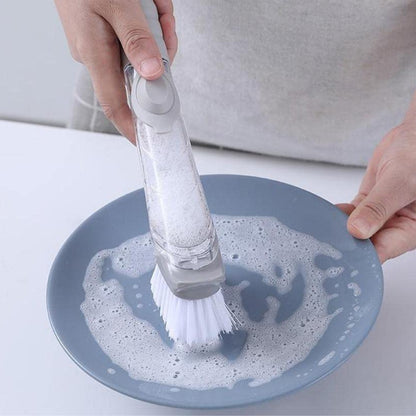 Wukusy 2-in-1 soap-dispensing dish brush set with ergonomic handle and cleaning brush head for kitchen dishwashing.