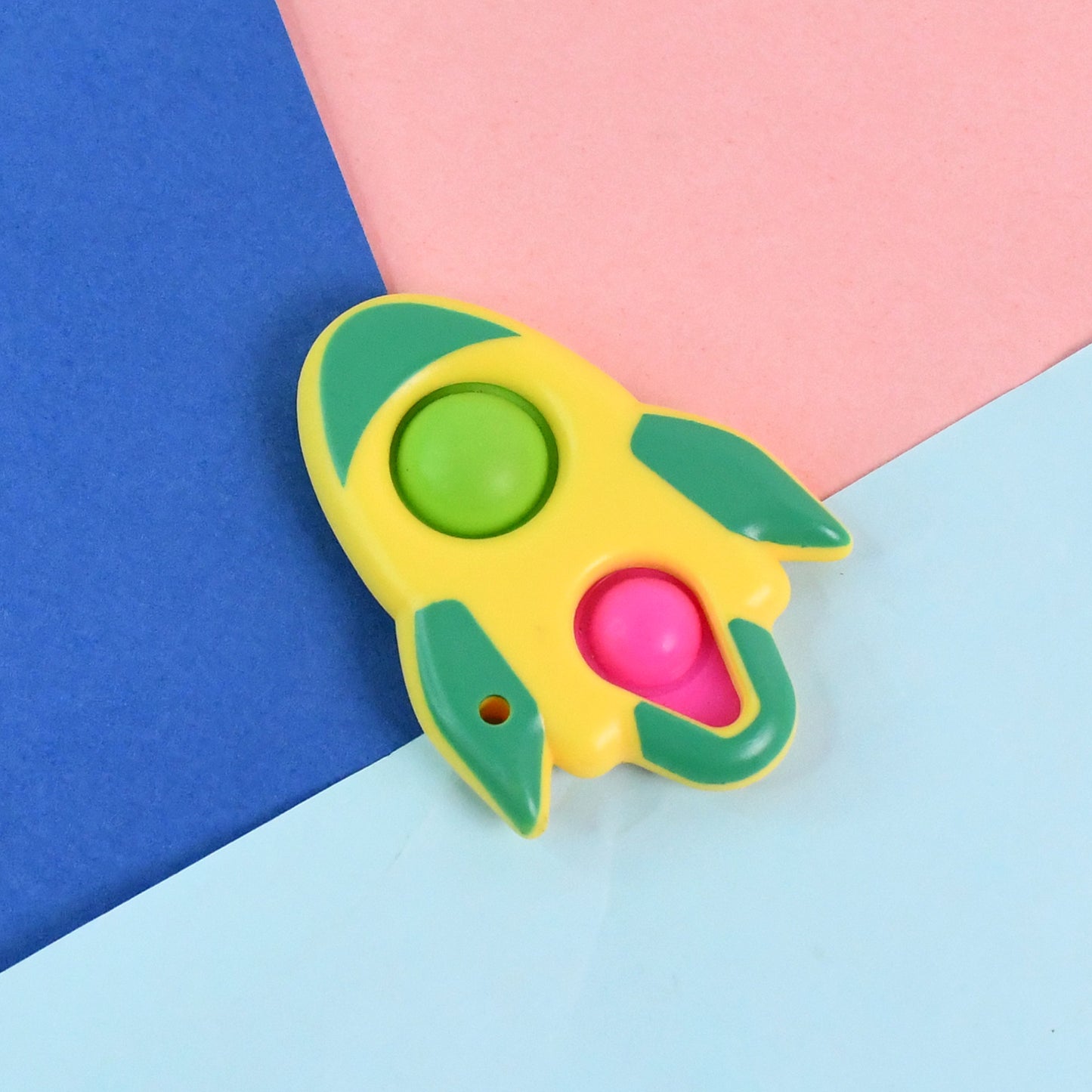 Rocket-shaped dimple keychain toy by Wukusy, featuring a colorful, playful rocket design perfect for key accessories.