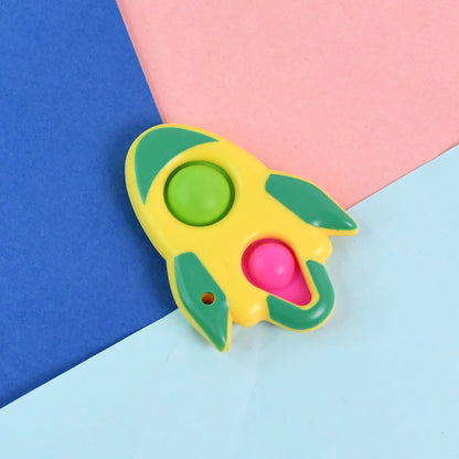 Rocket-shaped dimple keychain toy by Wukusy, featuring a colorful, playful rocket design perfect for key accessories.