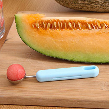 Wukusy 2-in-1 kitchen tool with soft fruit peeler and baller for avocado, papaya, watermelon, and honey dew in a home kitchen setting