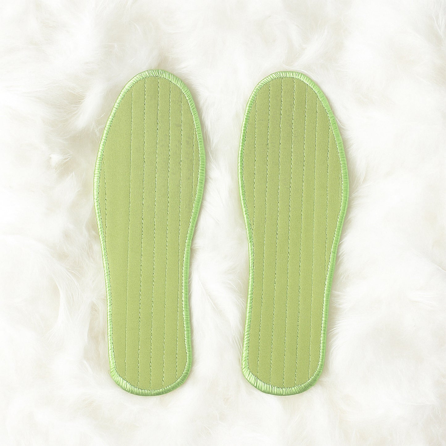Pair of Wukusy premium comfort shoe insoles in size 44, designed for daily foot support with a mix of stylish patterns