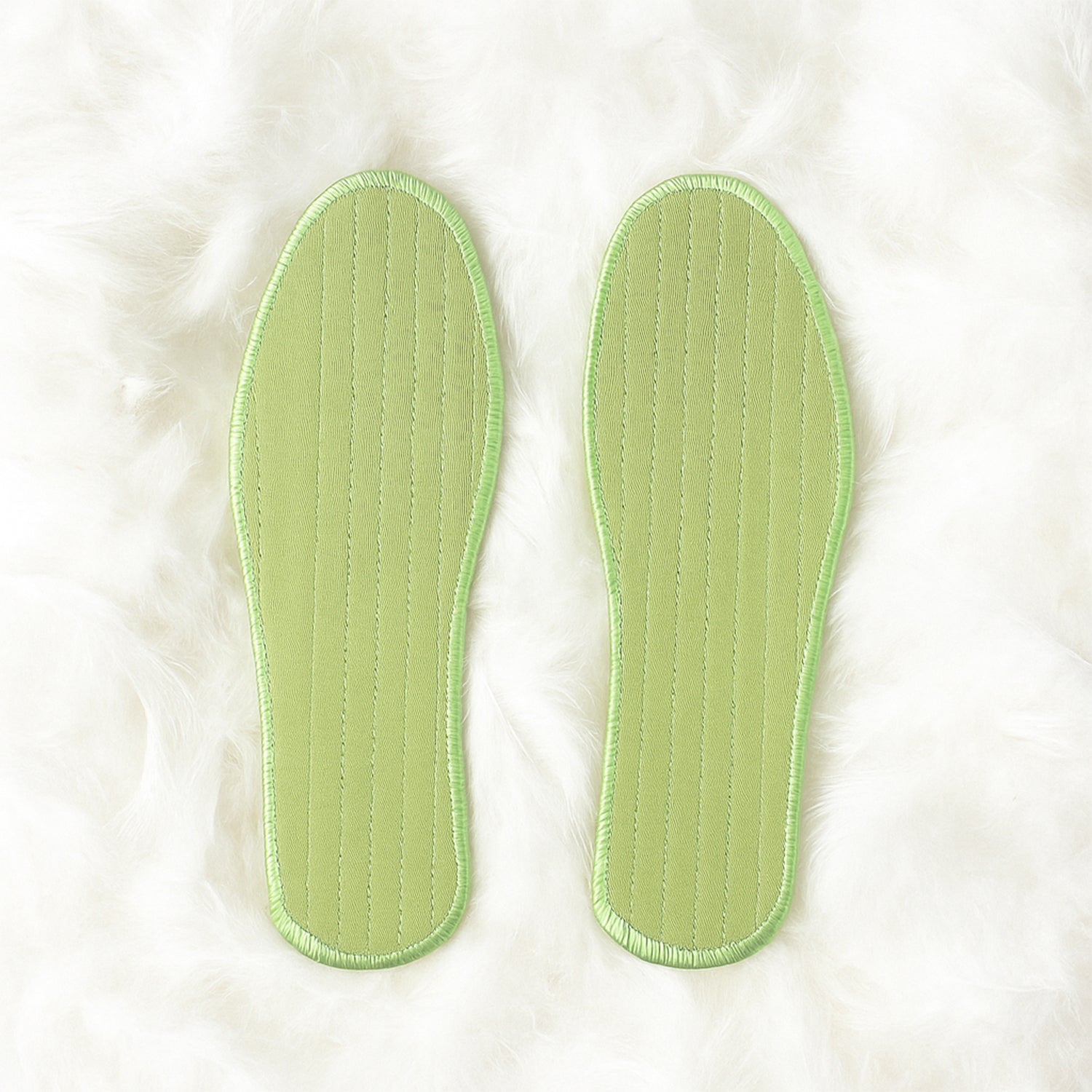 Pair of Wukusy premium comfort shoe insoles in size 44, designed for daily foot support with a mix of stylish patterns