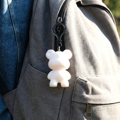 Wukusy cute bear figure keychain featuring a small, adorable bear design with a keyring attachment for easy carrying.
