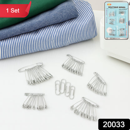 Assorted Wukusy metal safety pins in various sizes laid out on a white background, suitable for sewing, crafts, and household use.