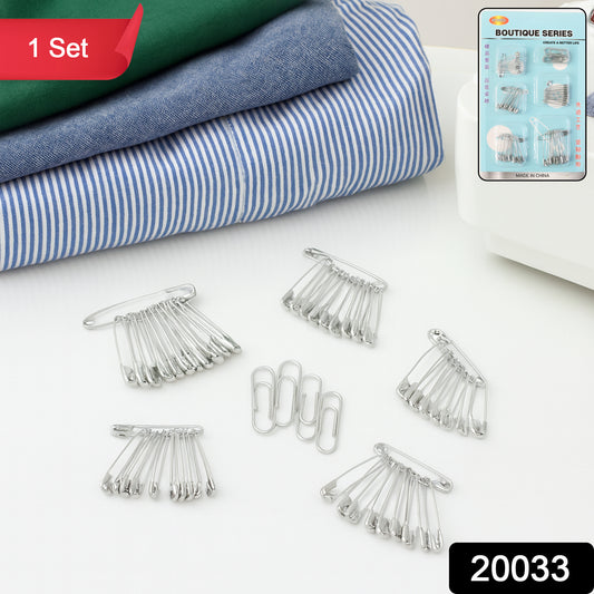 Assorted Wukusy metal safety pins in various sizes laid out on a white background, suitable for sewing, crafts, and household use.