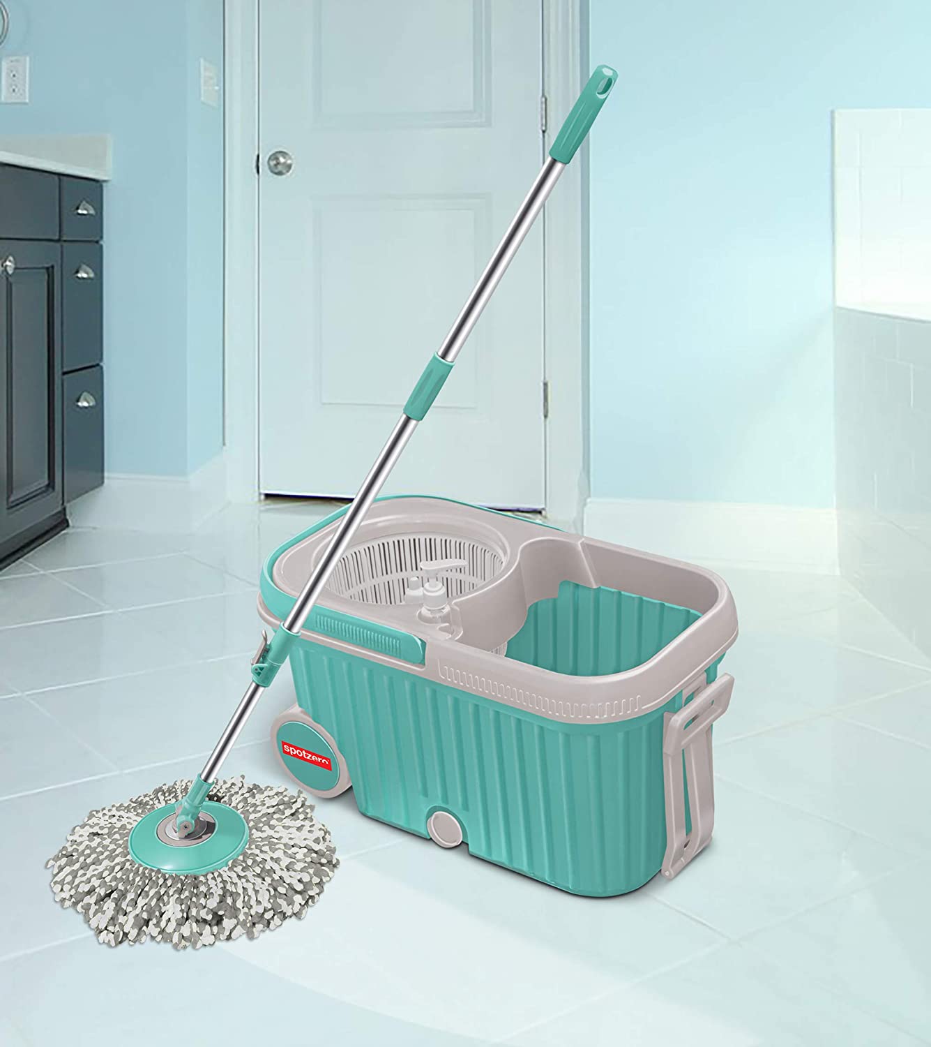 Wukusy 8703 Spin Mop with large wheels and plastic auto-fold handle for 360-degree cleaning, shown in a clean, modern home setting.