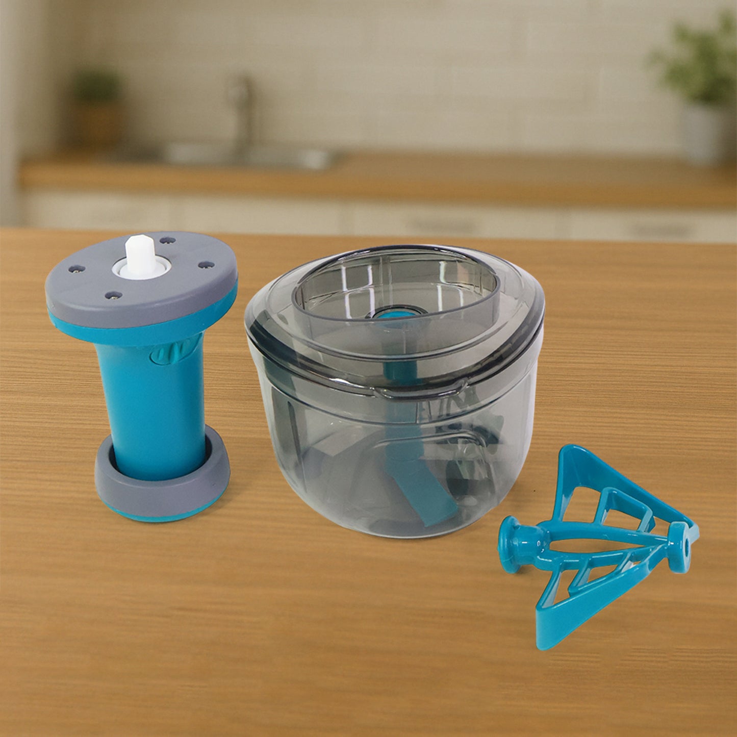 Wukusy Supermom Premium Tringo Push Chopper for easy kitchen vegetable and fruit chopping, compact and ergonomic design.