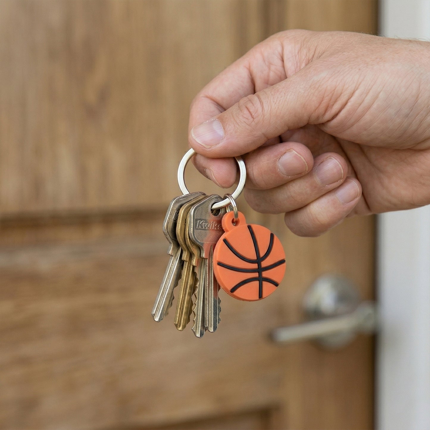 Set of 10 basketball design bag charm keychains by Wukusy featuring miniature basketballs and sporty accessories.