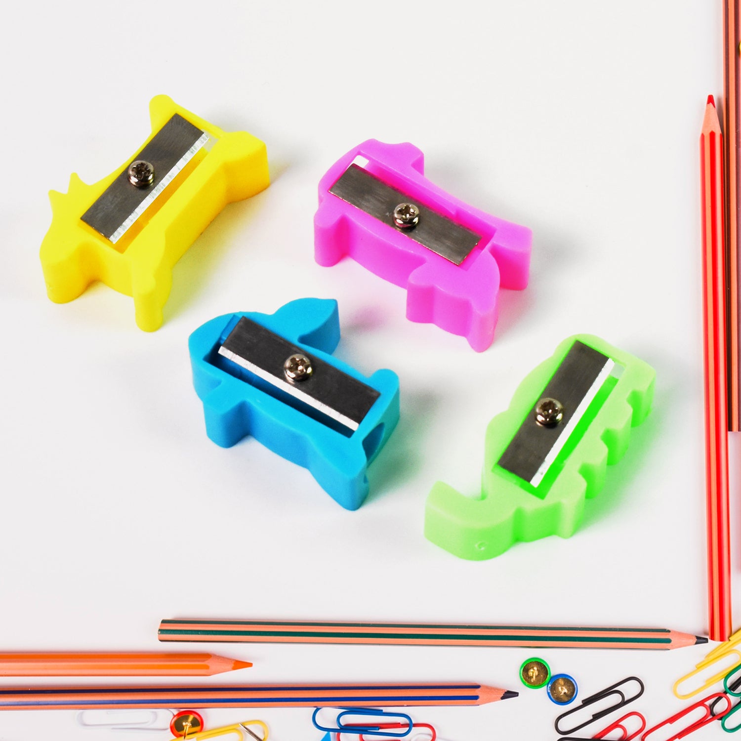 Small Wukusy plastic pencil sharpener with colorful mixed design, ideal for office and school use.