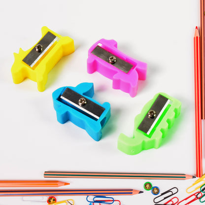 Small Wukusy plastic pencil sharpener with colorful mixed design, ideal for office and school use.