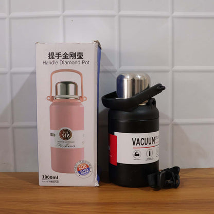 Wukusy 1000 ml stainless steel vacuum insulated flask bottle with leak-proof lid, designed for hot and cold beverages.