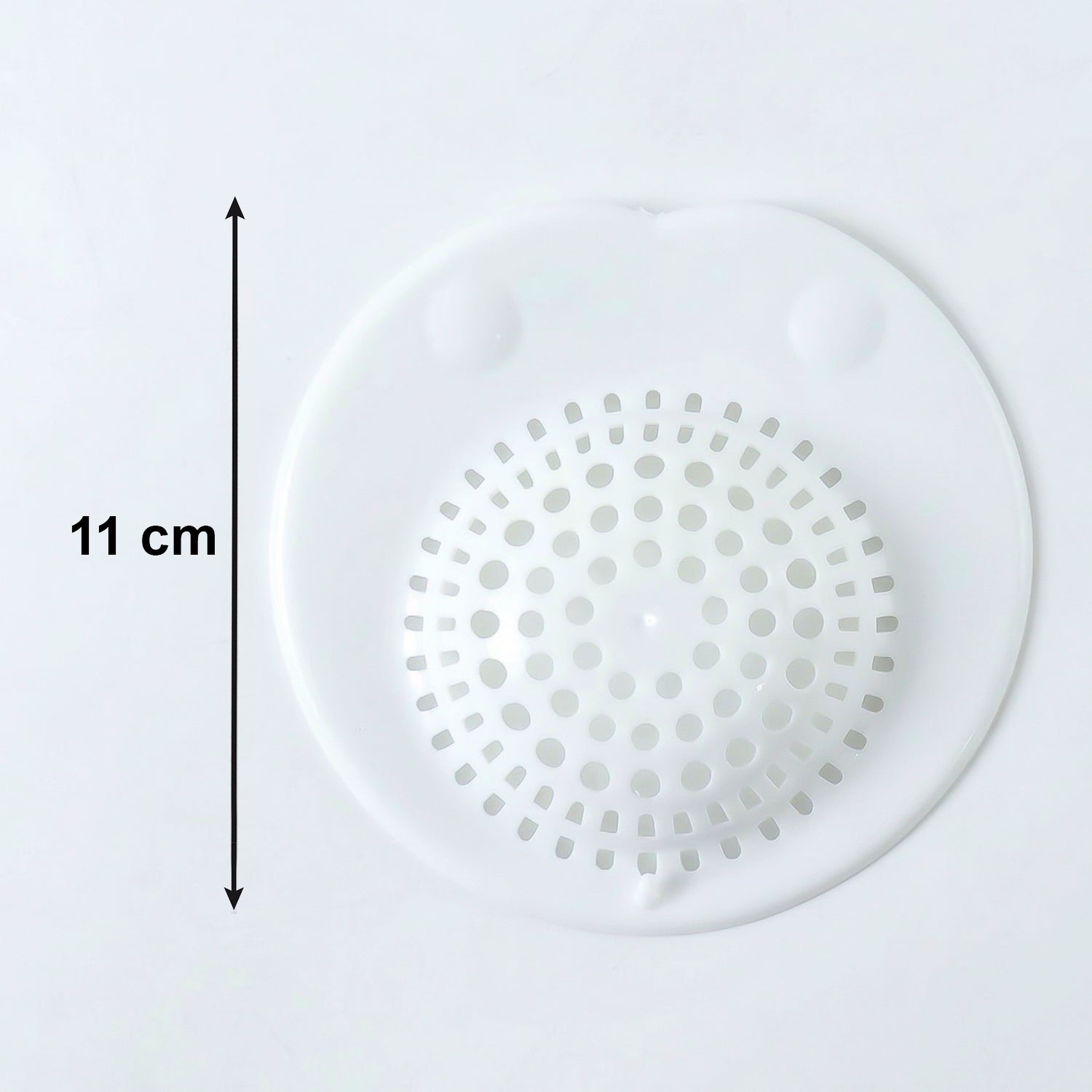 Flexible silicone sink drain strainer by Wukusy, showing a close-up of the black, mesh-like drain cover fitting into a kitchen sink.