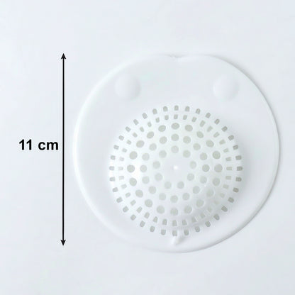 Flexible silicone sink drain strainer by Wukusy, showing a close-up of the black, mesh-like drain cover fitting into a kitchen sink.