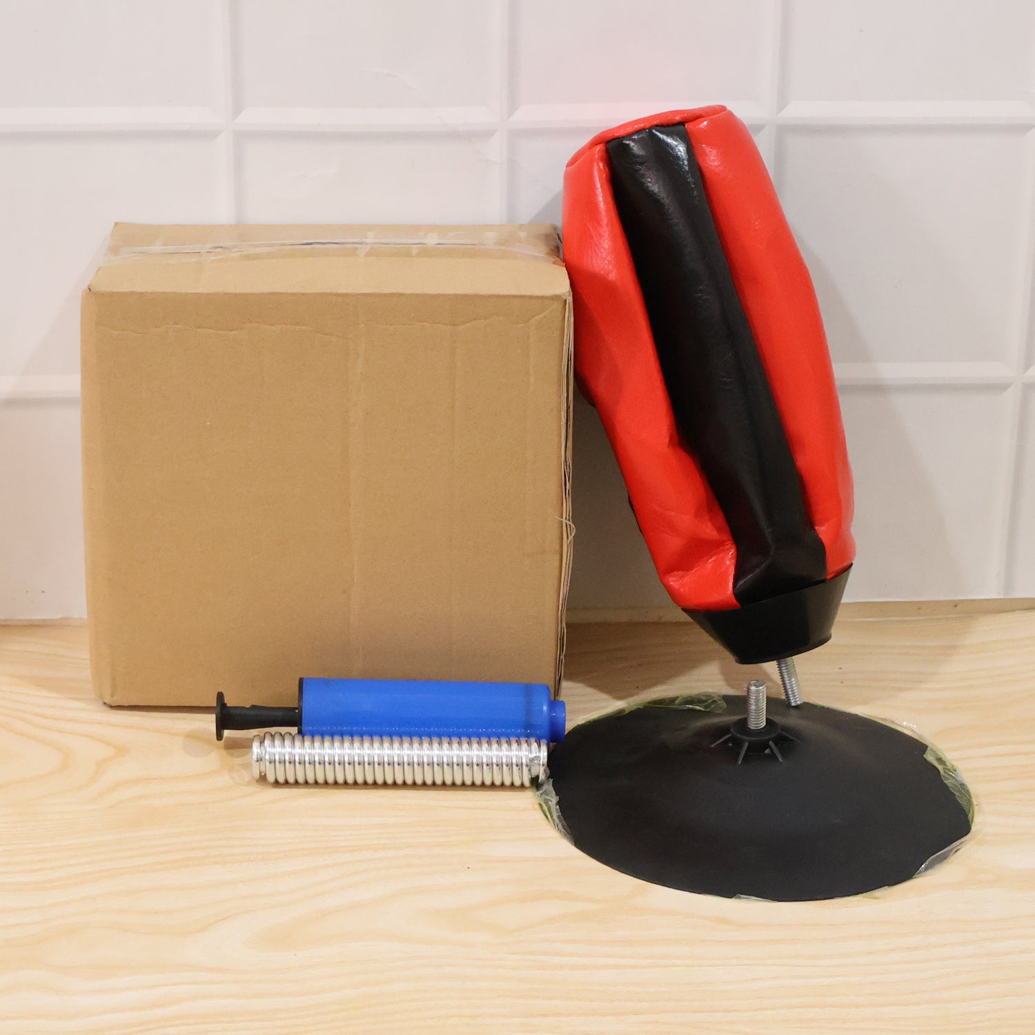Wukusy inflatable desktop punching bag with air pump, small portable punching bag for stress relief and fun.