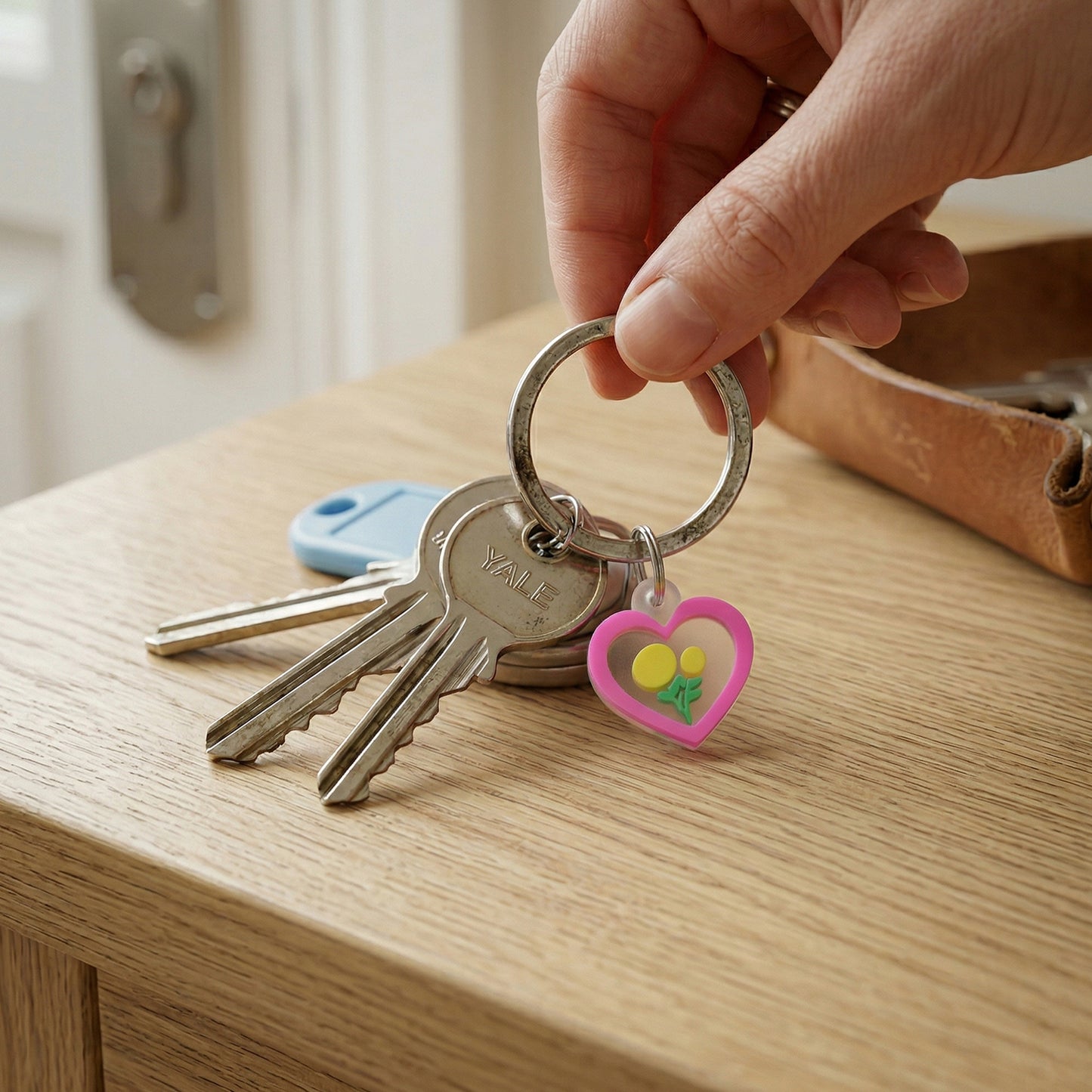 Wukusy heart flower design bag charm keychain set with 10 colorful decorative accessories, perfect for bags and keys.