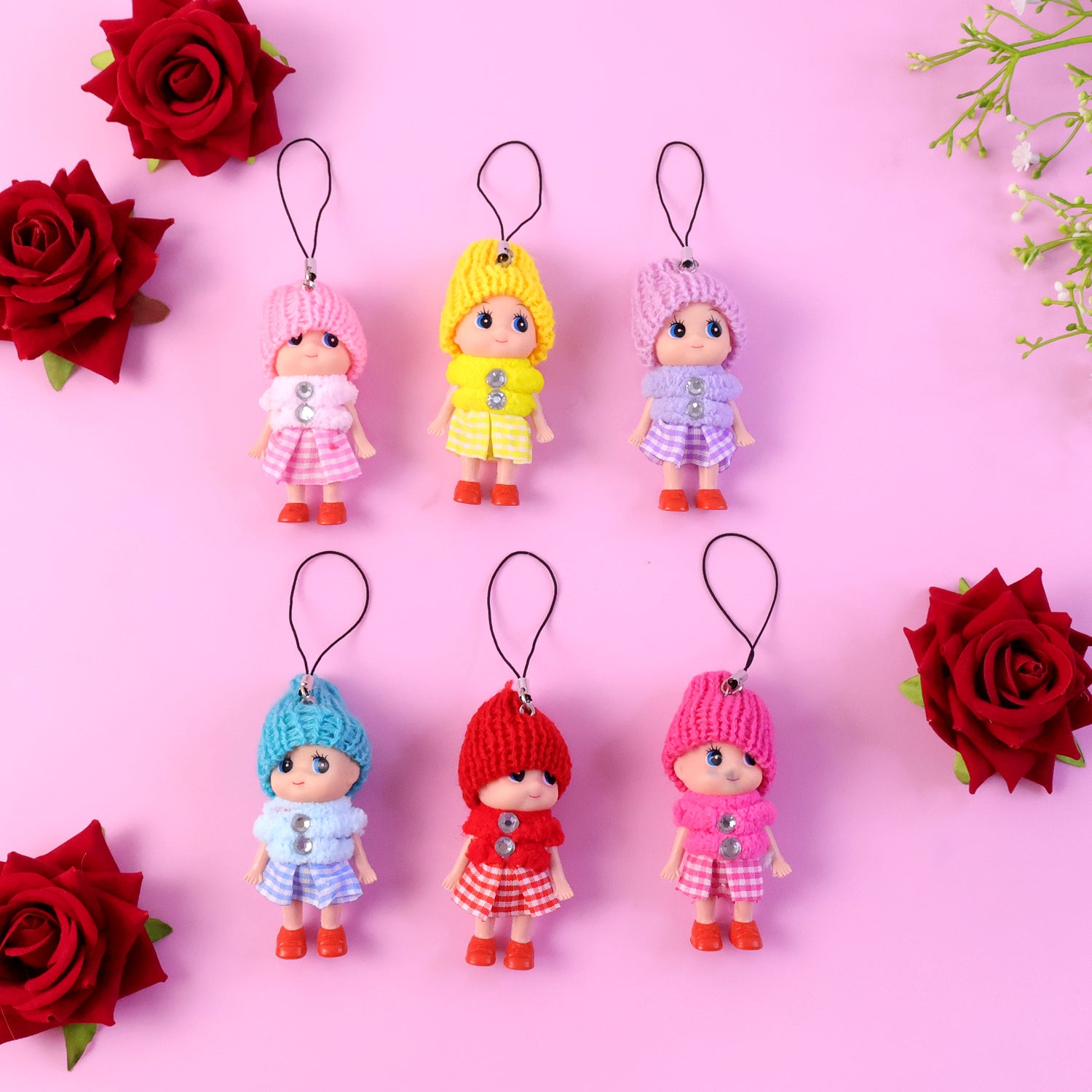 Six colorful Wukusy mini doll hanging keychains in a mix of bright colors, perfect for decorating keyrings or bags.