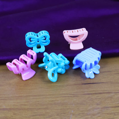 Set of three colorful plastic small hair clips for girls and kids, featuring mixed designs from Wukusy hair accessories collection.