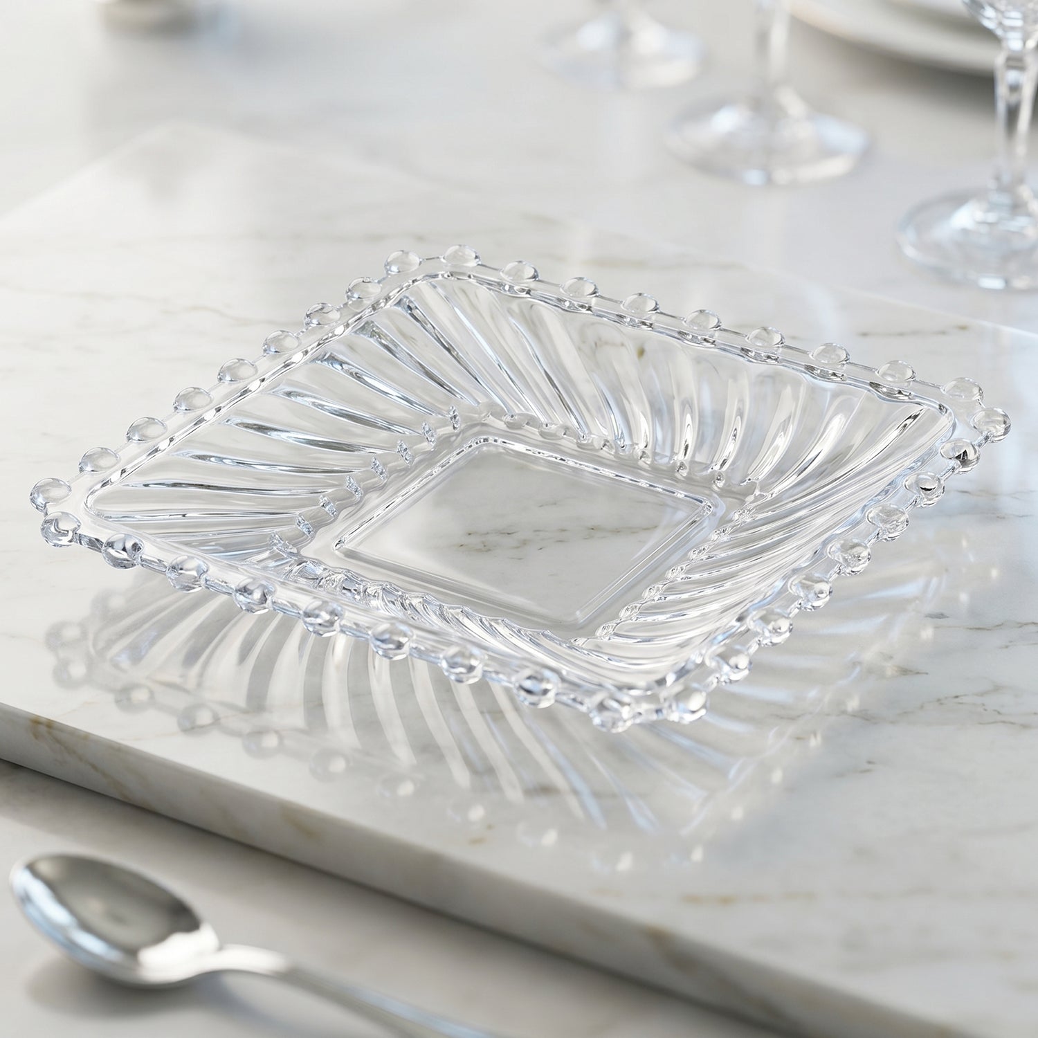 Set of 12 Wukusy Royal Premium glassware serving plates and bowls with clear, elegant designs on a white background.