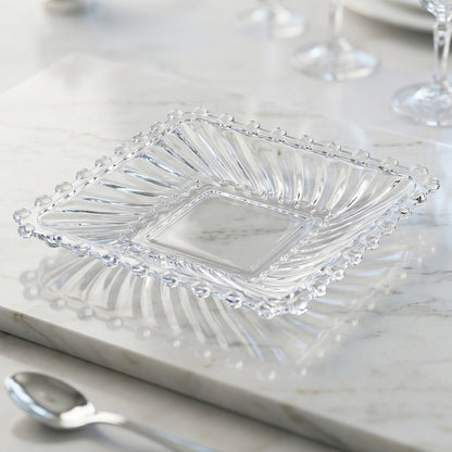 Set of 12 Wukusy Royal Premium glassware serving plates and bowls with clear, elegant designs on a white background.