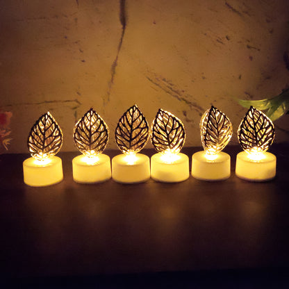 Set of 12 golden leaf-shaped flameless LED candles for home decor, featuring intricate leaf details and warm flickering light.