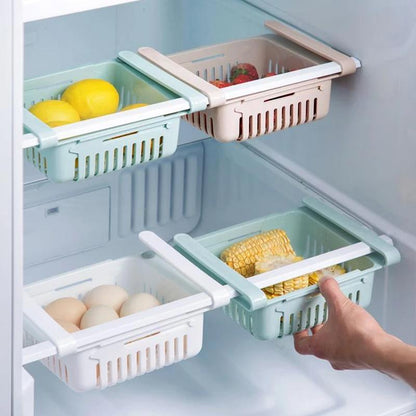 Wukusy 2336 expandable adjustable fridge storage basket showing multiple compartments for organized food storage.