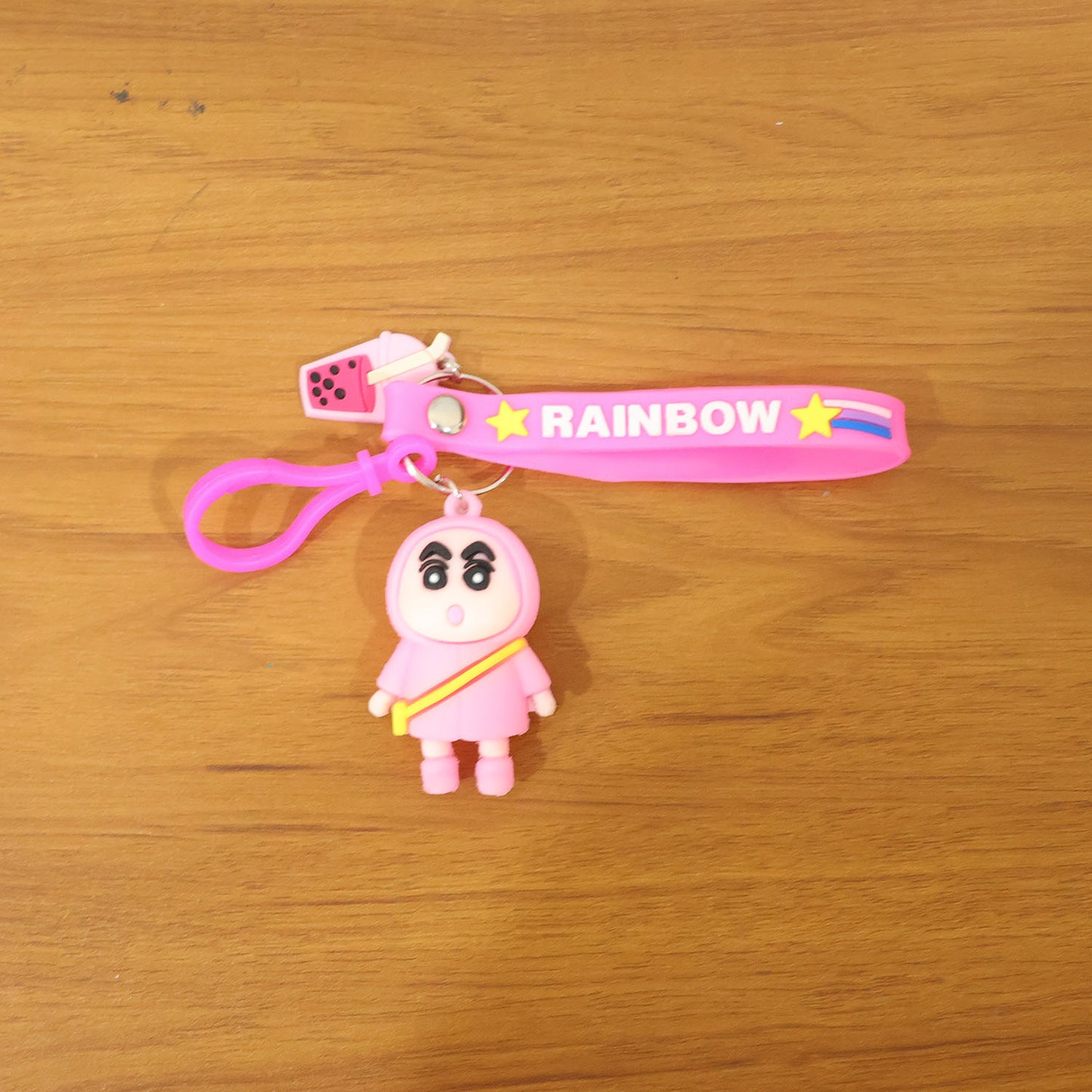Colorful cartoon character rainbow strap keychain by Wukusy featuring a cute character design and vibrant rainbow accents.