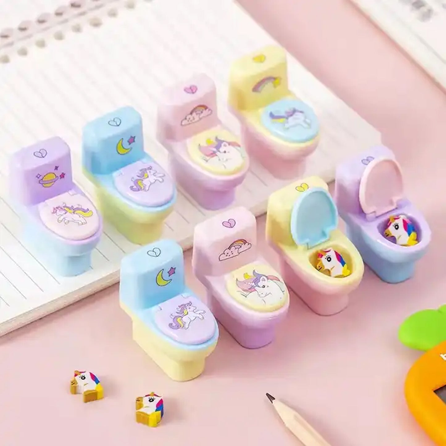 Wukusy toilet-shaped plastic pencil sharpener with eraser wheel, set of 2, featuring cute cartoon design for school stationery.