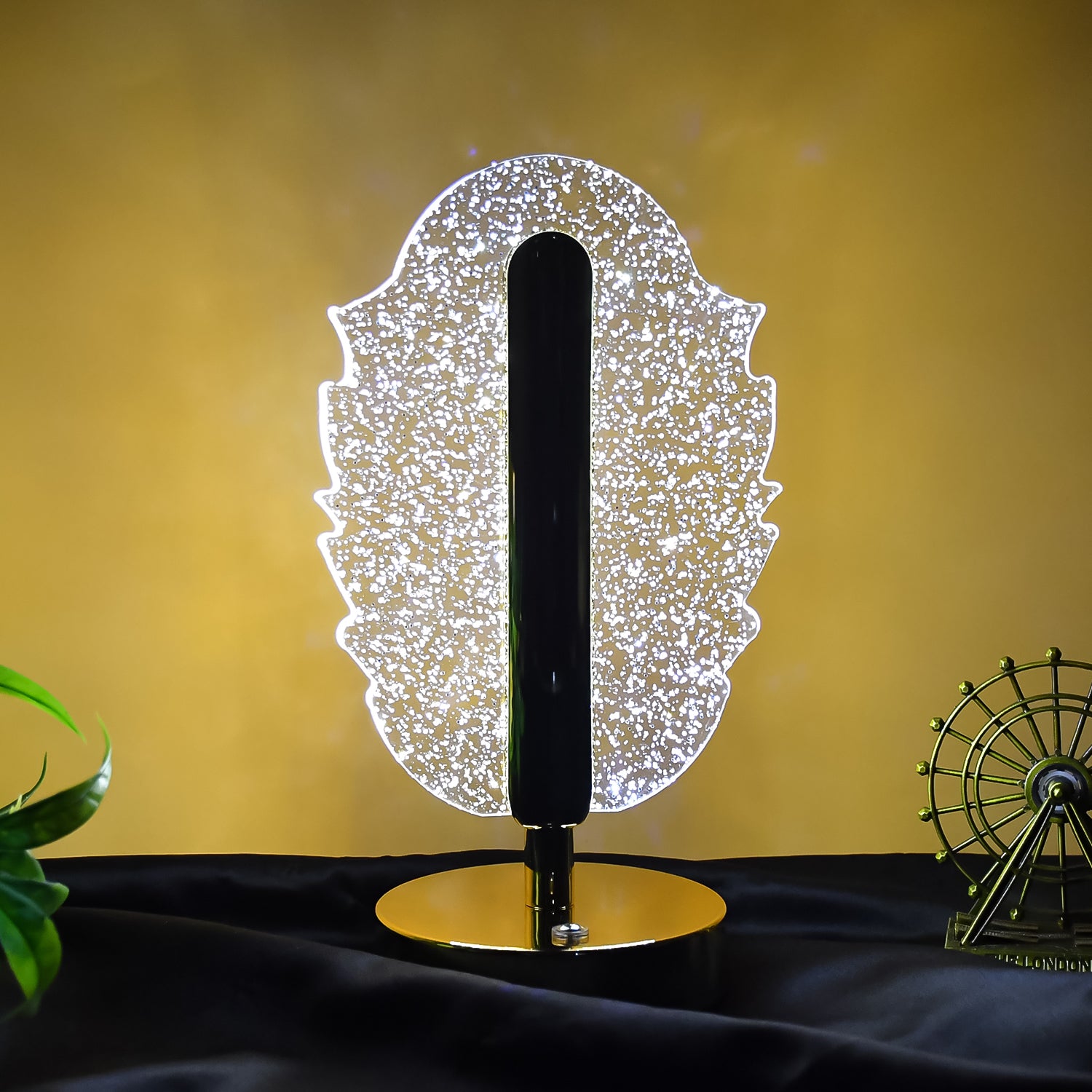 Elegant feather-shaped crystal table lamp by Wukusy, featuring intricate glass details and a stylish home decor design.