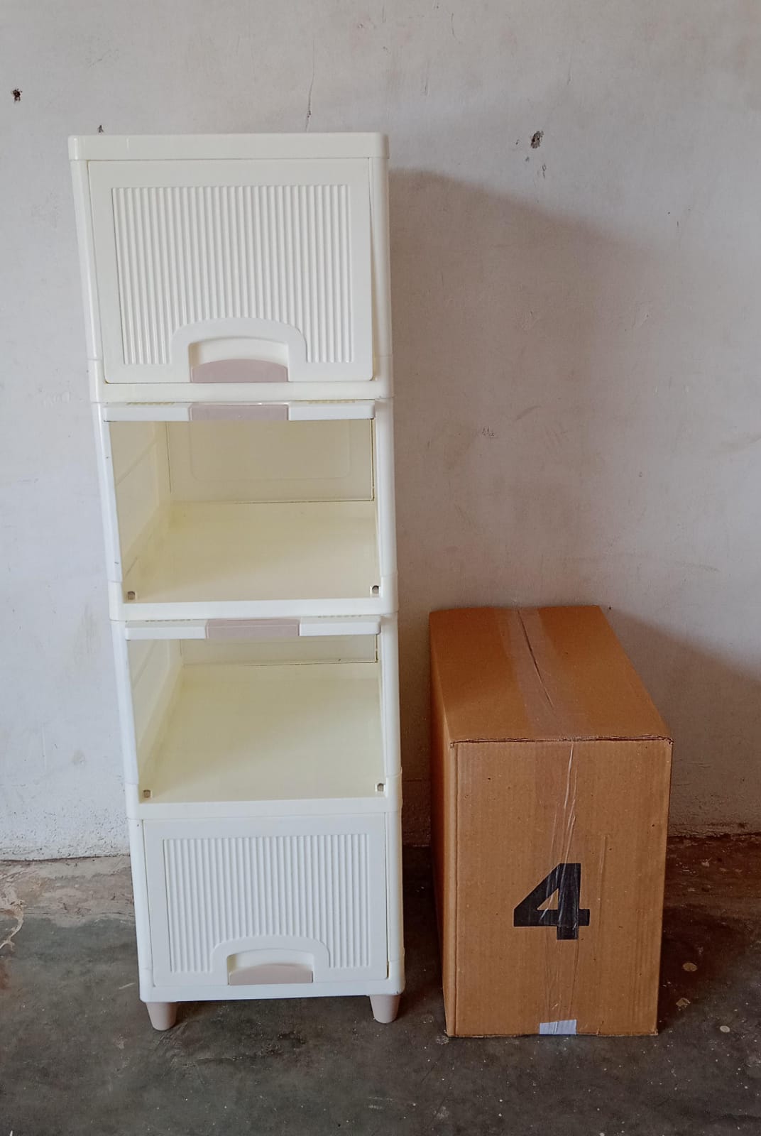 Wukusy 4-layer plastic storage cabinet with foldable drawers, ideal for kitchen, bathroom, or bedroom organization.