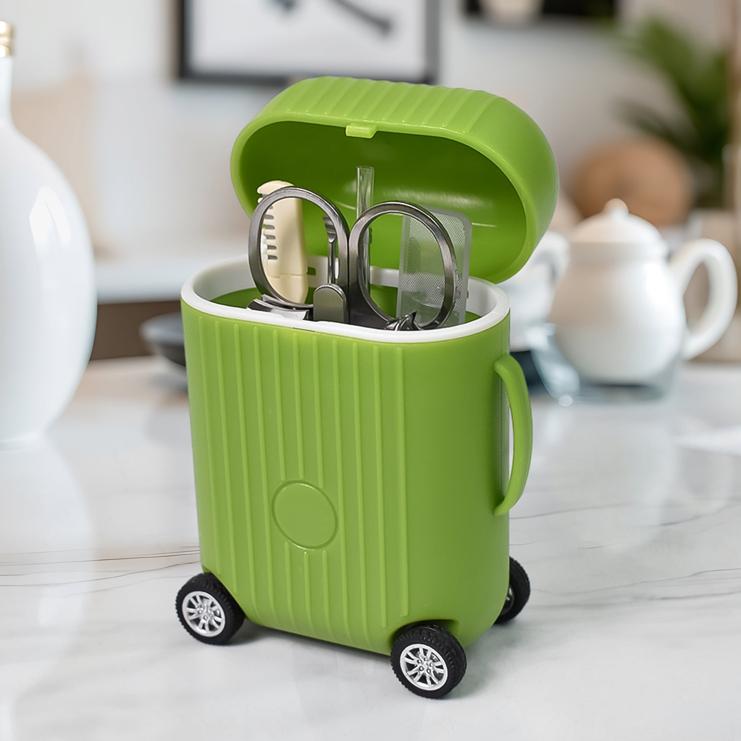 Wukusy 8-piece manicure and pedicure kit with nail clippers, tools, and mini trolley suitcase for foot and nail care.