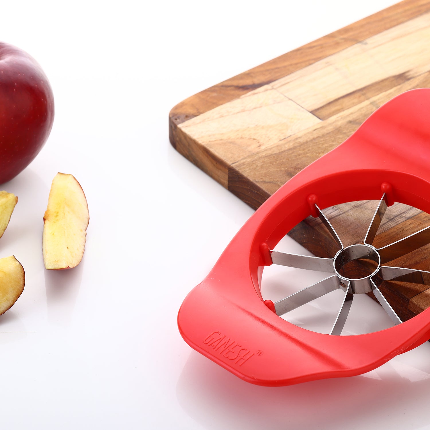 Wukusy 8124 Ganesh stainless steel apple cutter with plastic handle, colorful and durable for easy apple slicing.