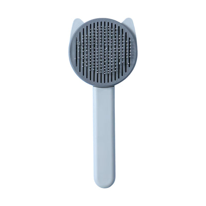 Wukusy soft pet hair removal needle comb showing fine metal teeth for gentle grooming of cats and dogs.