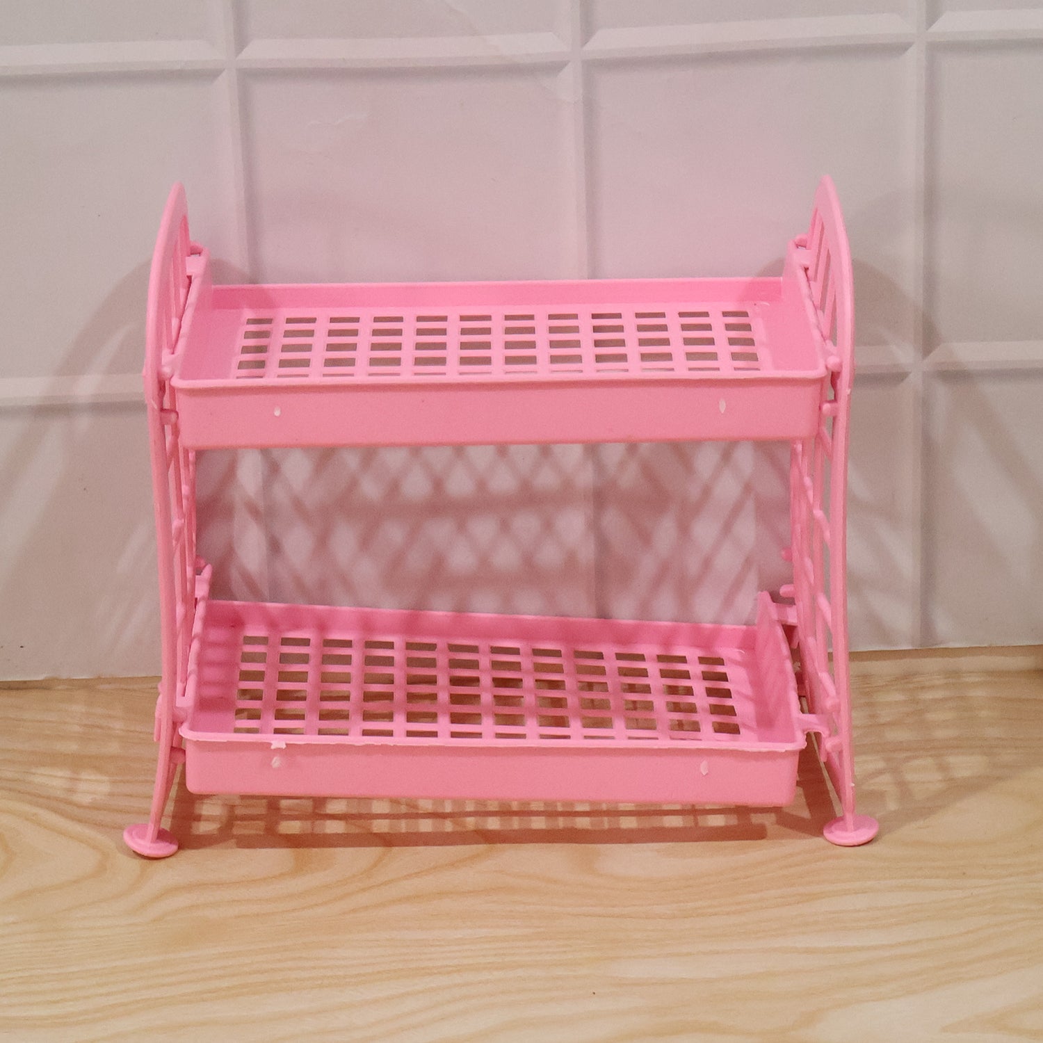 Wukusy 2-layer small plastic storage rack for kitchen, multipurpose organizer shelf with two compartments, compact and lightweight.