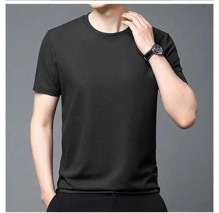 Men's 4-way stretchable round neck T-shirt by 1238, shown in a fitted style, made from flexible, comfortable fabric.