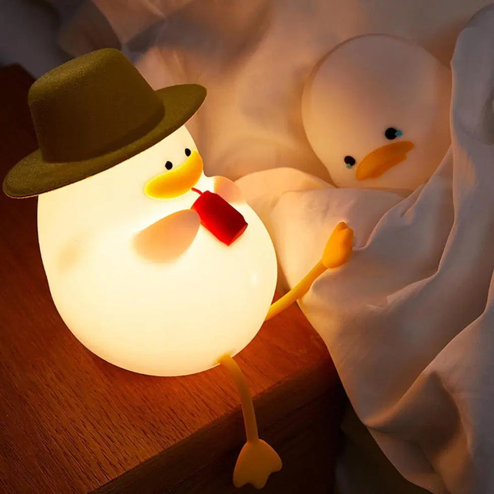 Cute duck night light from 1238, soft glow, shaped like a duck, perfect for children's bedroom or nursery lighting.