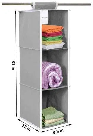 Cloth hanging wardrobe organizer with three shelves for utensils and accessories, by 1238, hanging inside closet or wardrobe.