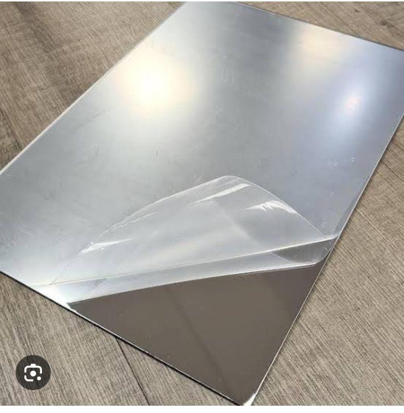 Set of two makeup mirrors, oval and square shapes, by 13064, featuring sleek reflective surfaces for personal grooming.