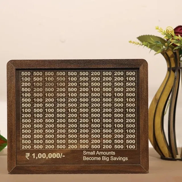 Brown Savings Challenge Money Bank from 13064, a ceramic money bank with a coin slot and savings challenge design.