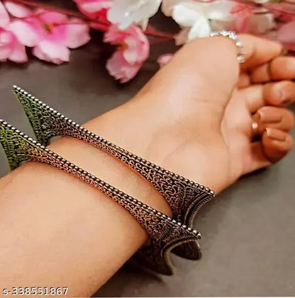 Silver-toned oxidised bangles with square-shaped ethnic pattern, part of women's jewellery set featuring traditional kada design.